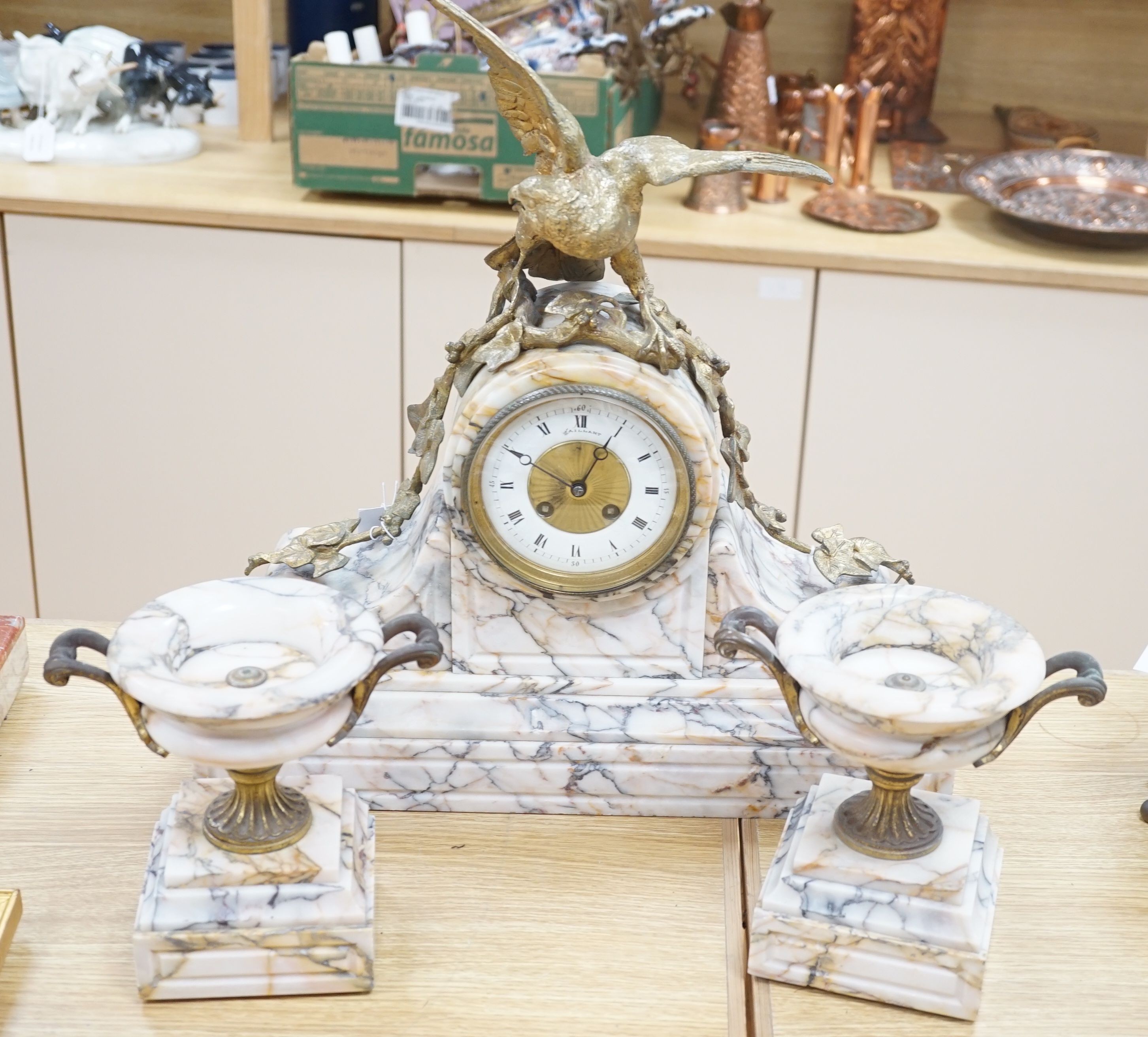 A late 19th century French marble clock garniture with bronze eagle, signed by J Moignier, height 51cm